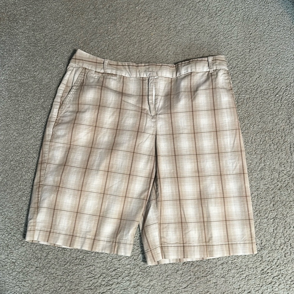 Izod size 14 brown and beige golf shorts.